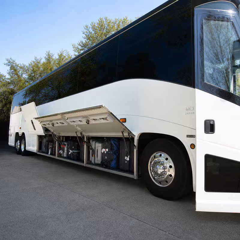 Party bus interior with wraparound leather seating and LED lighting in Baton Rouge