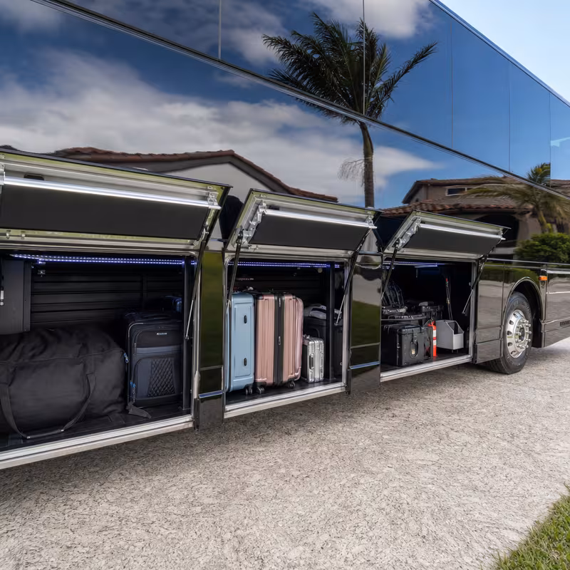 Party bus interior with wraparound leather seating and LED lighting in Baton Rouge
